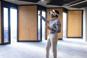 person interacting with VR in modern office space
