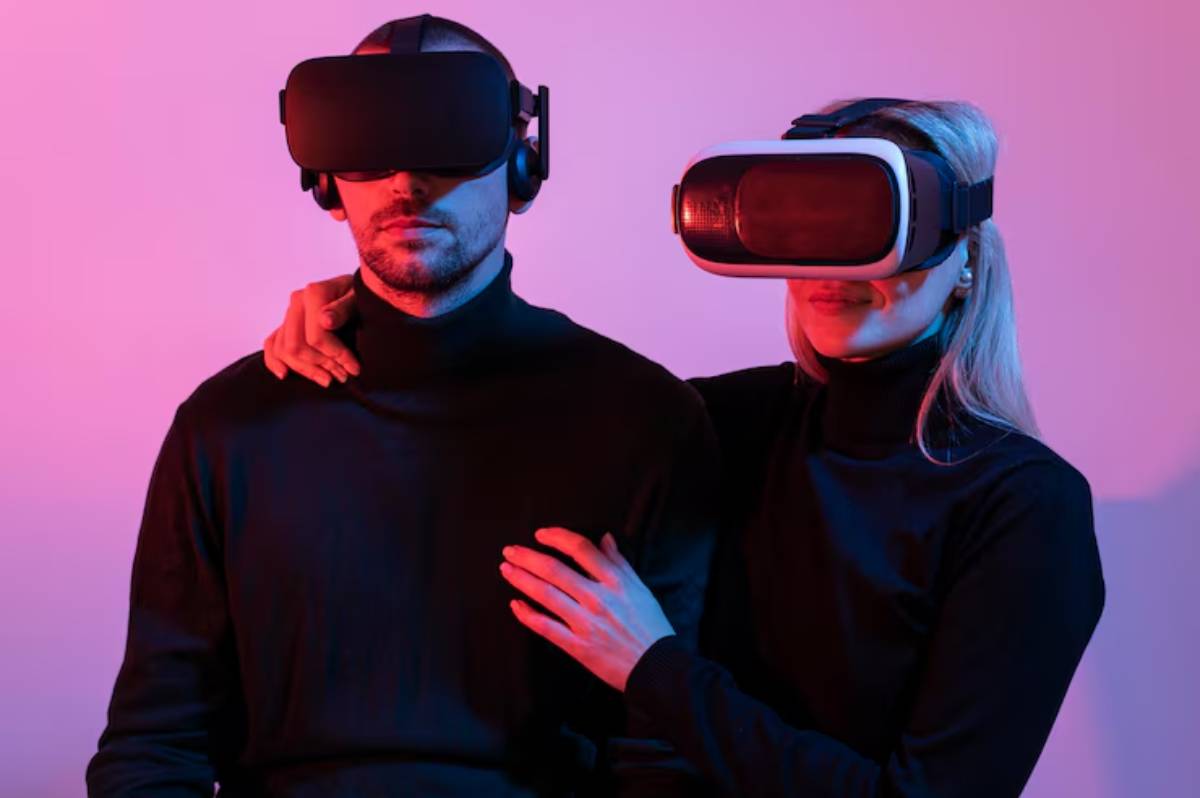 A man and woman wearing VR headsets, styled in dark turtlenecks, pose against a backdrop of vibrant purple and pink lighting.