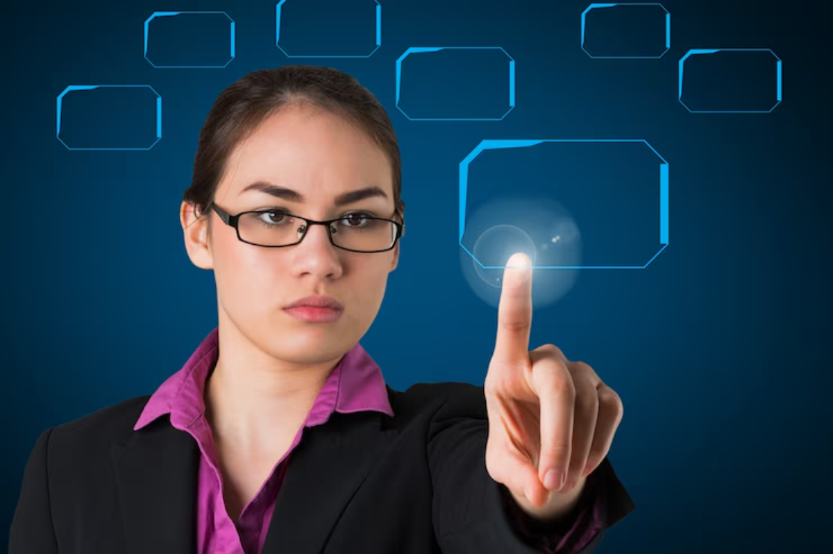 A professional woman in a suit touches a glowing interactive screen with digital shapes in the background.