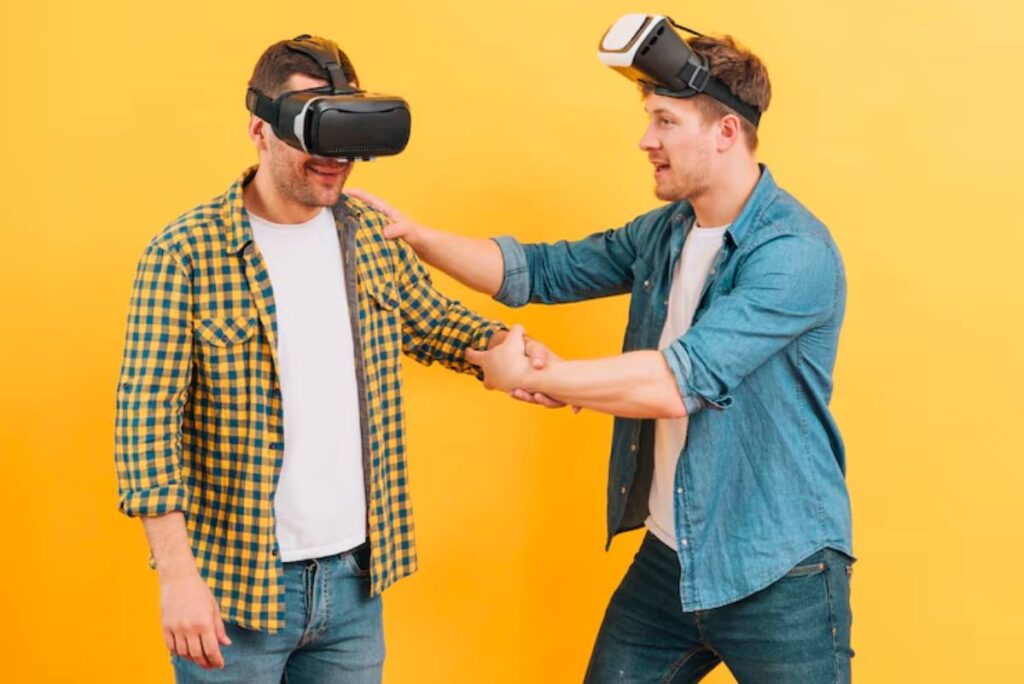 Two individuals wearing VR headsets engage in a friendly interaction against a bright yellow background.