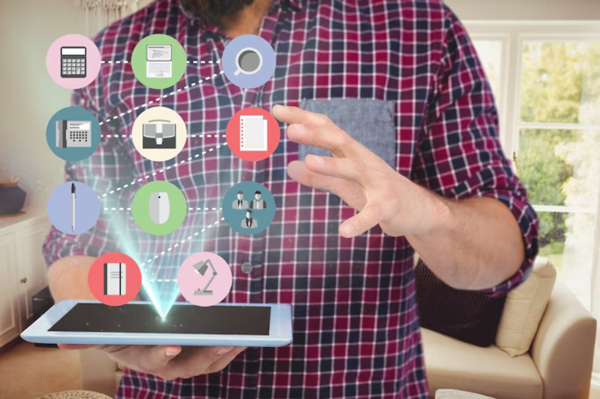A man in a plaid shirt interacts with a tablet, projecting icons of digital tools and resources in a modern living room.