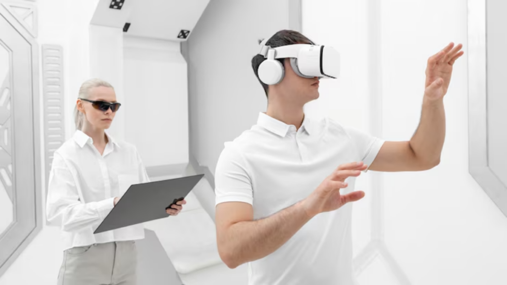 A person wearing a VR headset interacts with a virtual environment while another individual observes and holds a clipboard.