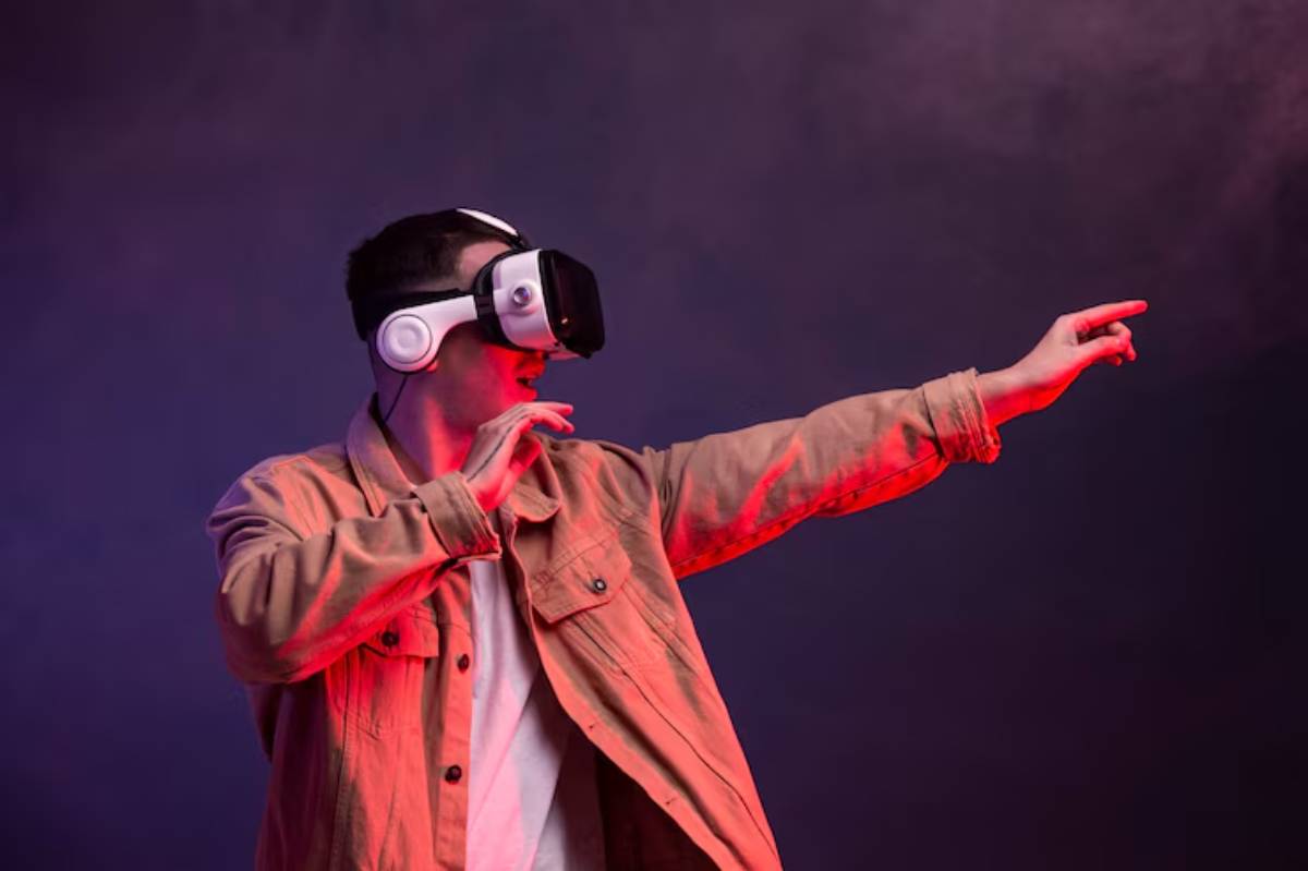 A person wearing a VR headset and headphones strikes a dynamic pose, with a colorful smoky background in red and purple hues.