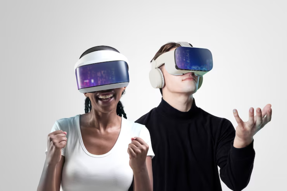 Two people wearing virtual reality headsets and headphones express excitement while interacting with digital content.